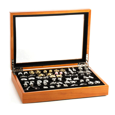 One of our top sellers. The felted compartments can accommodate up to 36 pairs of cufflinks (six pairs per row). This Honey Cufflink Collector’s Case was handcrafted by skilled craftsmen, fitted with reliable yet chic metal hinges and finished in a sweet honey varnish.