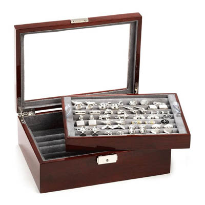 This absolutely gorgeous oak case has everything you need to keep your favorite and most fashionable cufflinks in order. The clear glass top makes for easy viewing, and the luxurious grey suede compartments can accommodate up to 72 pairs of cufflinks.